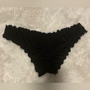 Ruffled black swimsuit bottom, size medium